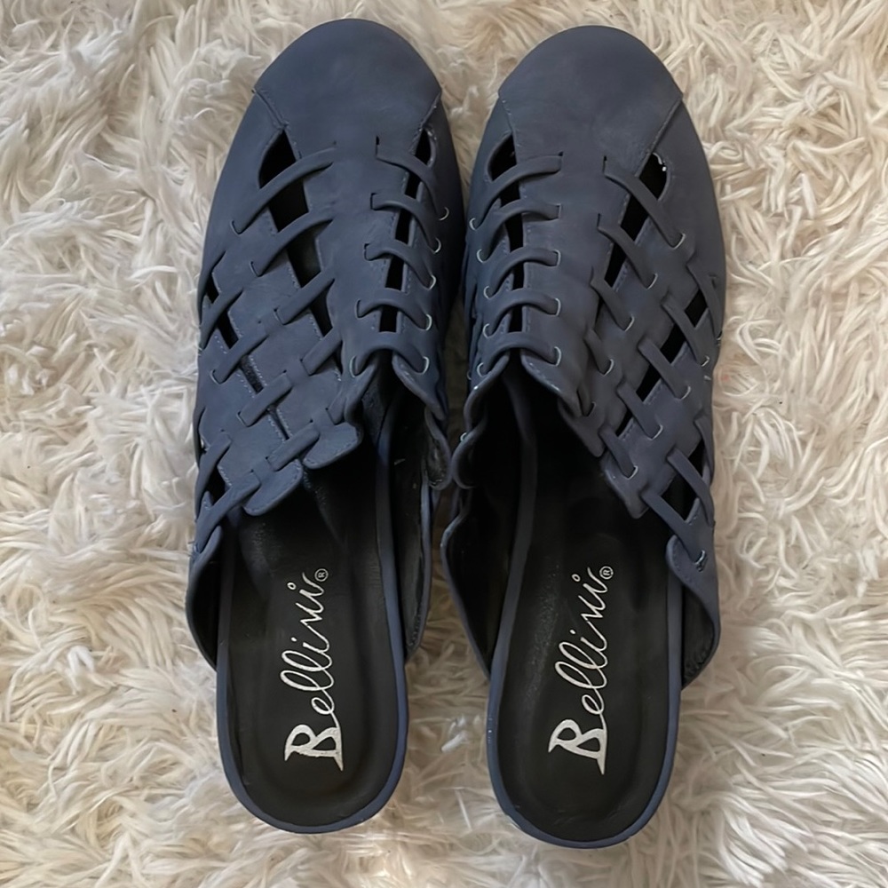 Dark blue slip on shoes. Brand is Bellini. Size 11W.